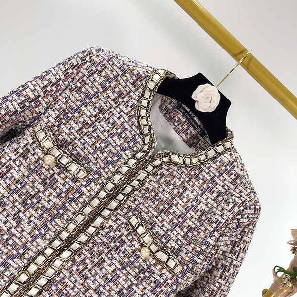 Elegáns kabát gyöngyház gombokkal