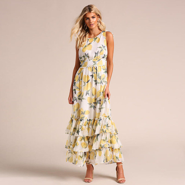 Alkalmi női hosszú ruha modell fehér színben, virágmintával