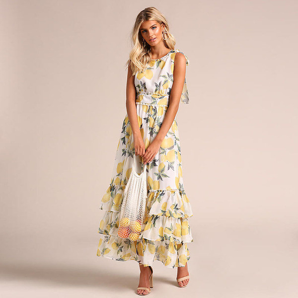 Alkalmi női hosszú ruha modell fehér színben, virágmintával