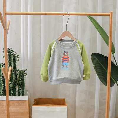 Új modell gyerekblúz O-nyakkal és rátéttel - két színben