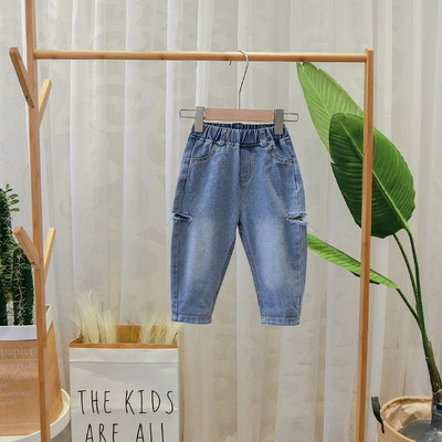 Gyermek farmernadrág új modellje szakadt motívumokkal fiúknak kék színben