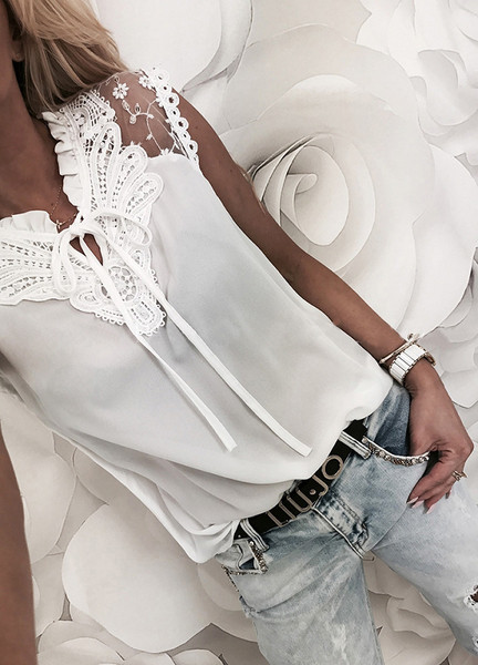 Modern női felső, fehér és rózsaszín nyakkendővel