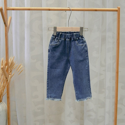 Modern gyerekfarmer fiúknak, kék színben szakadt motívumokkal