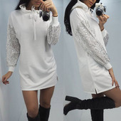 Modern női hosszú pulóver, fehér flitterekkel