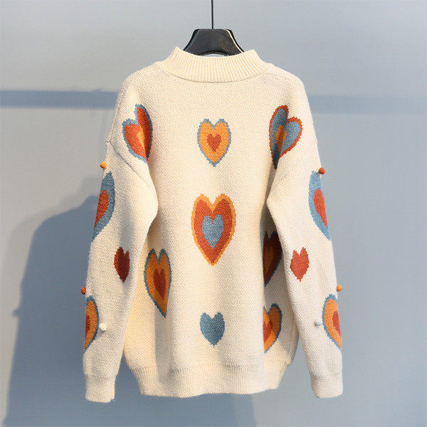 ÚJ Női téli pulóver hímzéssel - széles modell