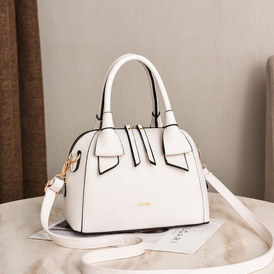 Alkalmi női táska két füllel több színben