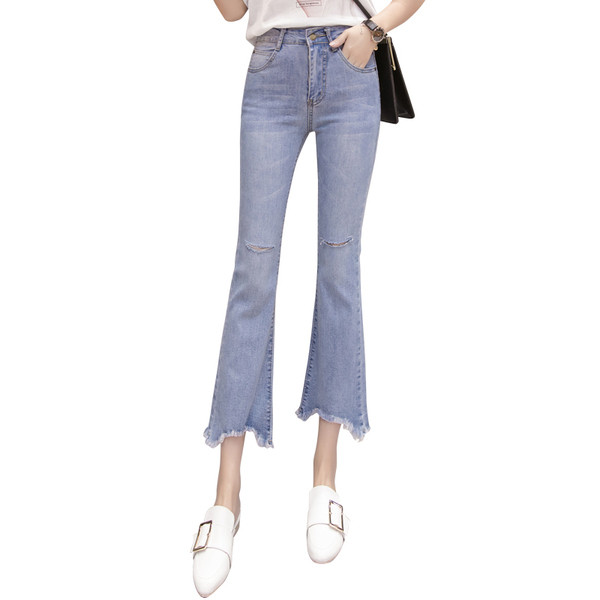 Modern női farmer Karcsú modell szakadt motívumokkal