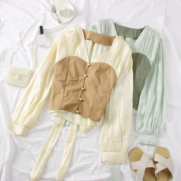 Új modell stílusos női blúz nyakkendővel több színben