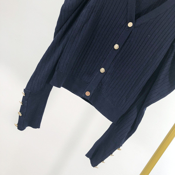 Új modell női kardigán gombokkal, kék színben