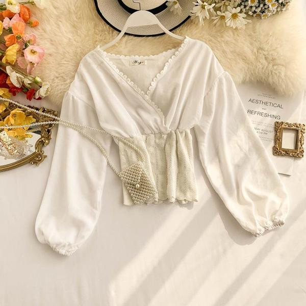 Καθημερινή  γυναικεία μπλούζα με μακρύ μανίκι σε μαύρο και άσπρο χρώμα