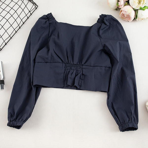 Μοντέρνα γυναικεία μπλούζα σε τέσσερα χρώματα με κουμπιά