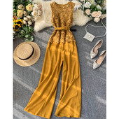 Elegáns női overál széles modell csipkével és övvel több színben