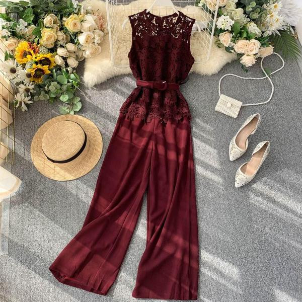 Elegáns női overál széles modell csipkével és övvel több színben