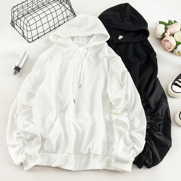 Καθημερινή  γυναικεία μπλούζα σε τρία χρώματα με τσέπη και κορδόνια