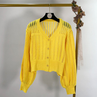 Σύντομη γυναικεία ζακέτα με κουμπιά σε τέσσερα χρώματα