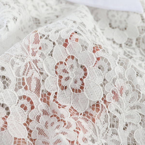 Γυναικέιο δαντελοτό φόρεμα σε μαύρο και άσπρο χρώμα