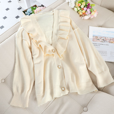 Μοντέρνα γυναικεία ζακέτα με κουμπιά σε διαφορετικά χρώματα