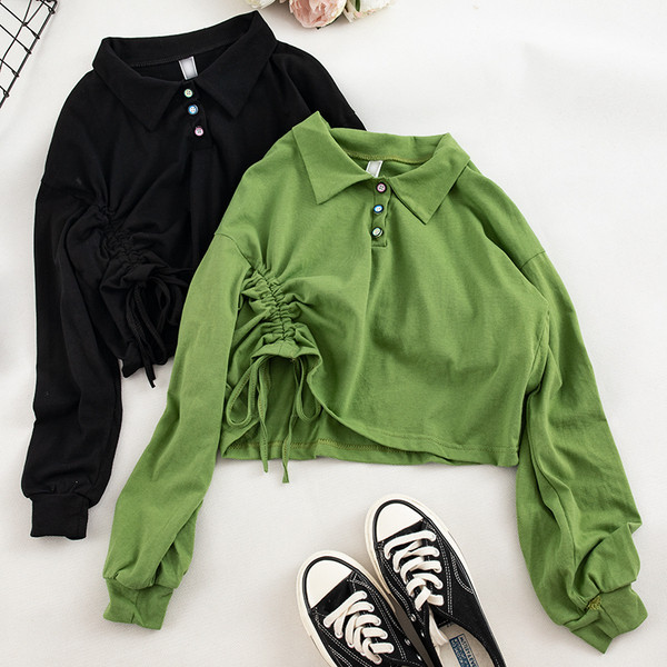 Γυναικεία μπλούζα σε μαύρο και πράσινο με κουμπιά και  κορδόνια