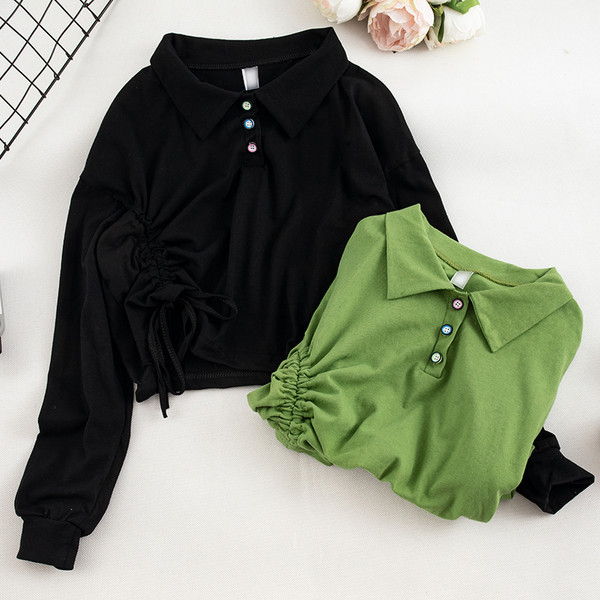 Γυναικεία μπλούζα σε μαύρο και πράσινο με κουμπιά και  κορδόνια