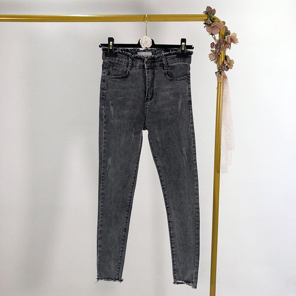 Női farmer karcsú modell szakadt motívumokkal, két színben