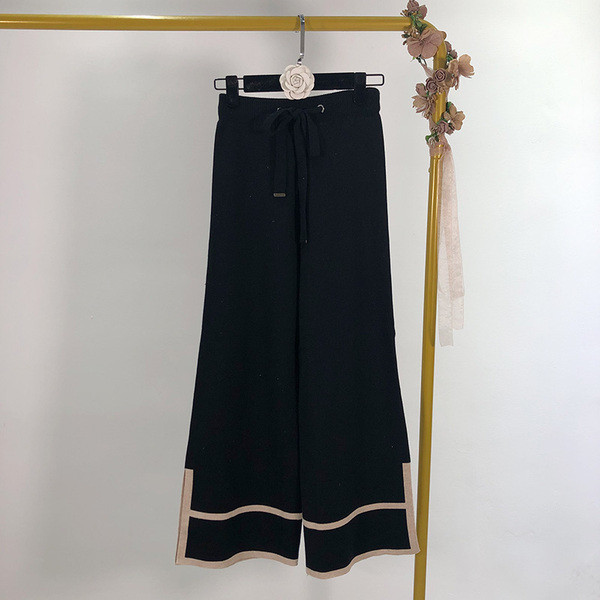 Pantaloni largi de dama din tricotat subtire cu cravate in doua culori