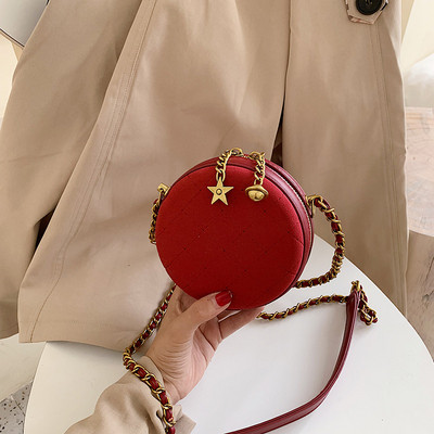 Στρογγυλή  γυναικεία τσάντα με φερμουάρ με μεγάλη λαβή