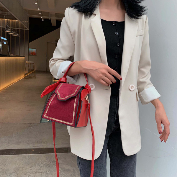 Női táska hosszú és rövid fogantyúval