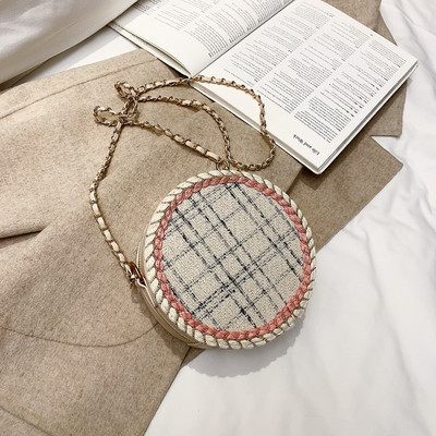 Γυναικεία τσάντα σε στρογγυλό σχήμα σε δύο χρώματα