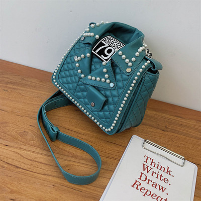 Μοντέρνα γυναικεία έκο δερμάτινη τσάντα με μαργαριτάρι διακόσμηση