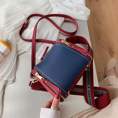 Női táska cipzáras díszítéssel több színben