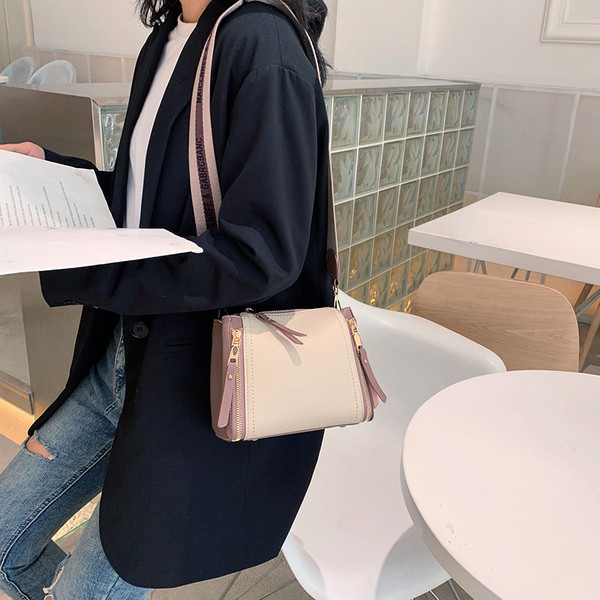 Női táska cipzáras díszítéssel több színben