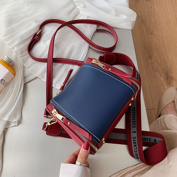 Női táska cipzáras díszítéssel több színben