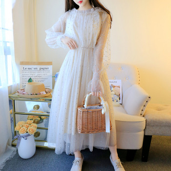 Κυρίες κομψό μακρύ φόρεμα με μακρύ μανίκι