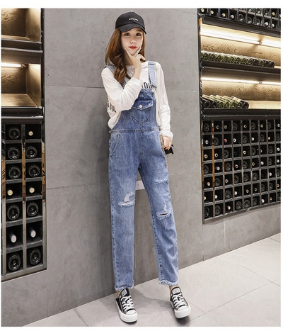 Γυναικείες μπλε ολόσωμες  φόρμες με σχισμένα μοτίβα