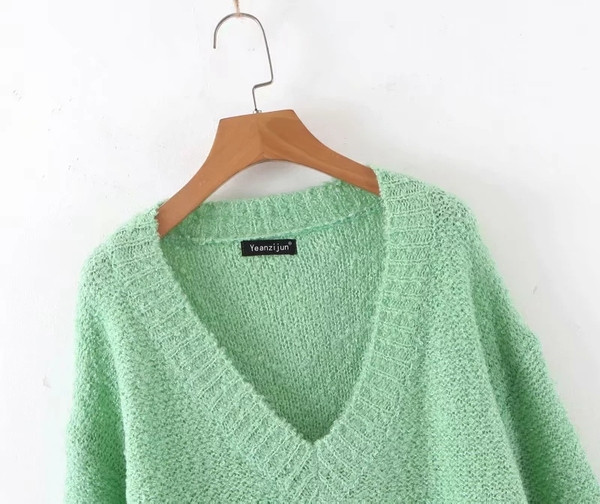 Κομψό γυναικείο πουλόβερ σε  πράσινο χρώμα