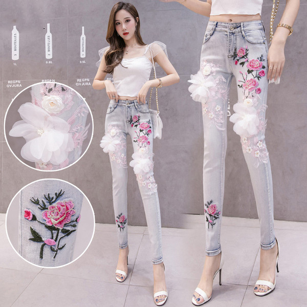 Blugi moderni de dama cu model floral si element 3D