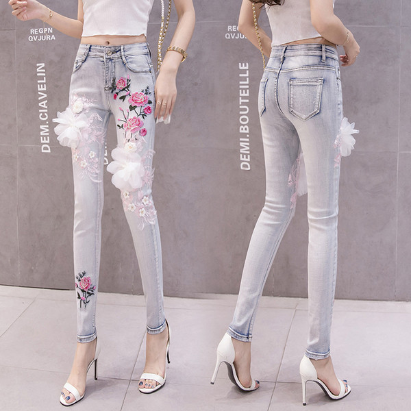 Blugi moderni de dama cu model floral si element 3D