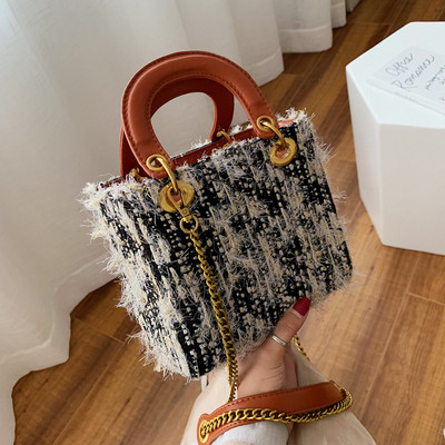 Μοντέρνα γυναικεία  τσάντα με μικρή και μεγάλη λαβή