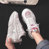 Μοντέρνα γυναικεία αθλητικά παπούτσια  με γυαλιστερό λευκό αποτέλεσμα