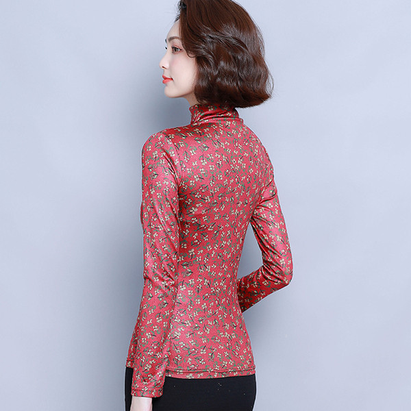 Μοντέρνα γυναικεία μπλούζα σε μπλε και κόκκινο χρώμα με μοτίβα λουλουδιών