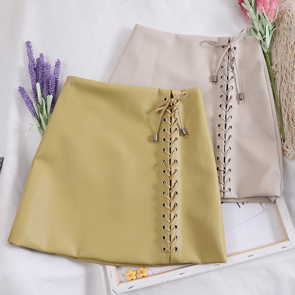 Μοντέρνα γυναικεία φούστα δερματίνι - σε τέσσερα χρώματα με δεσμούς