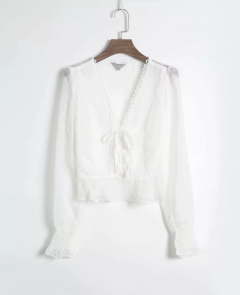 Νέο μοντέλο γυναικεία μπλούζα  με  κορδόνια και λαιμόκοψη στο πορτοκαλί και λευκό χρώμα