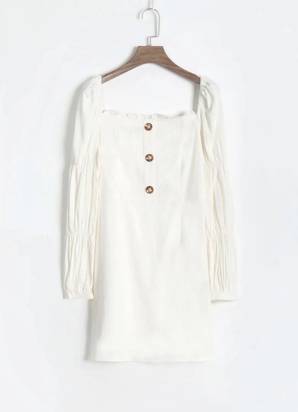 Γυναικκείο  φόρεμα με  κουμπιά σε λευκό χρώμα