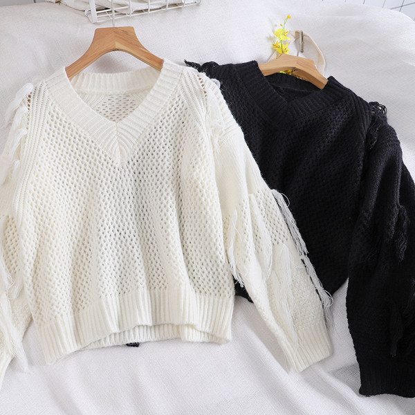 Modern női pulóver fehér és fekete színben