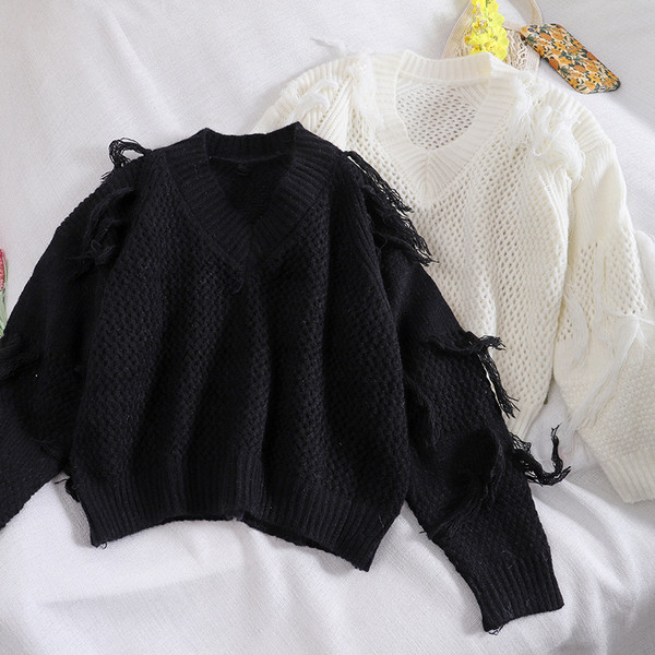 Modern női pulóver fehér és fekete színben