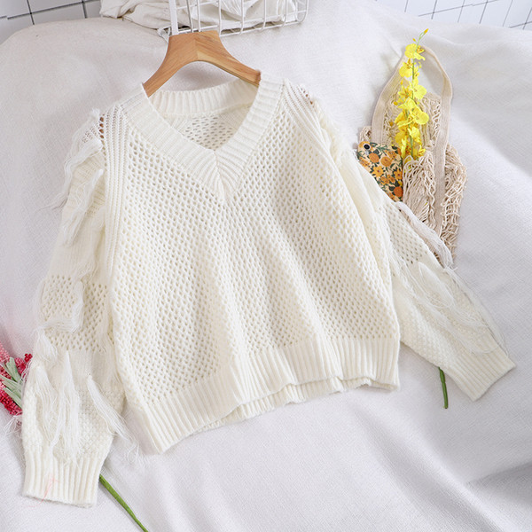 Modern női pulóver fehér és fekete színben