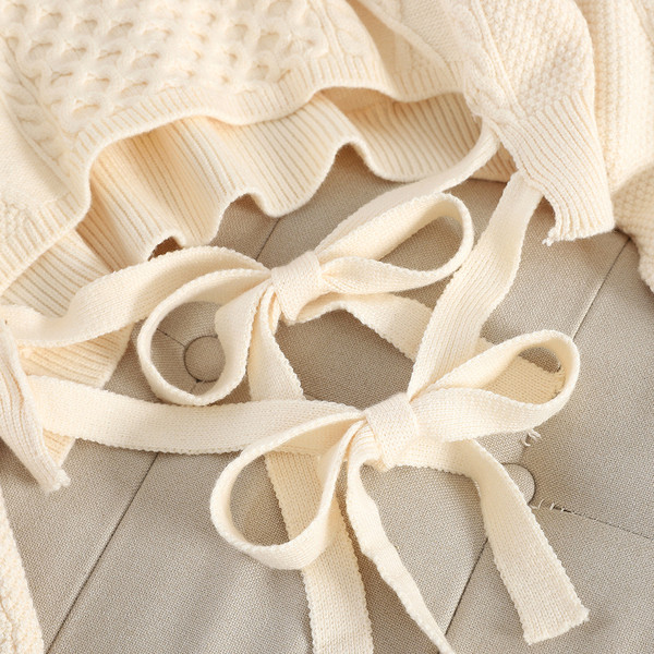 Μοντέρνο γυναικείο πουλόβερ με δεσμούς σε διάφορα χρώματα