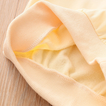 Нов модел актуална детска блуза с апликация и О-образно деколте в бежов цвят