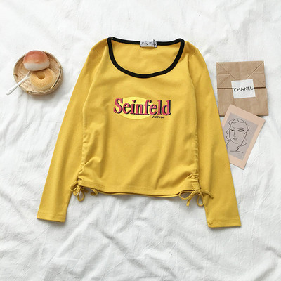 Alkalmi női blúz felirattal és nyakkendővel