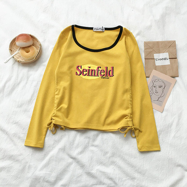 Alkalmi női blúz felirattal és nyakkendővel